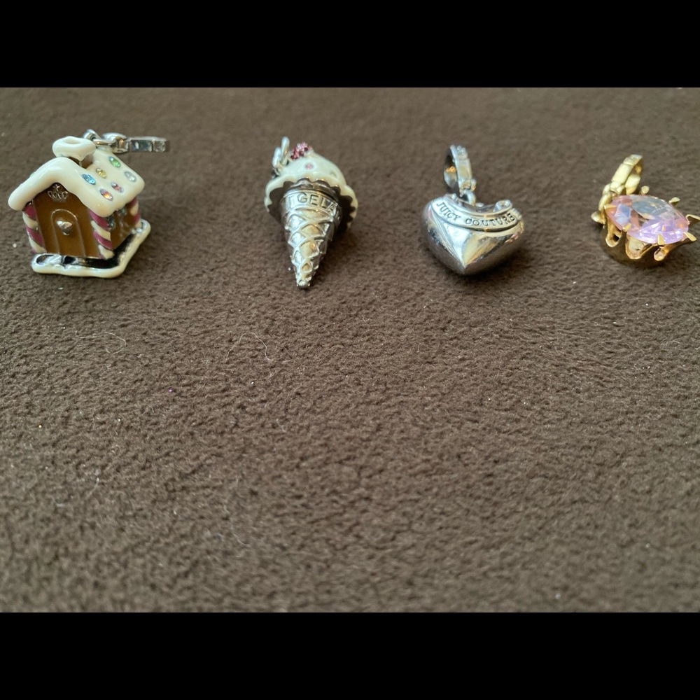 FOUR JUICY COUTURE CHARMS
